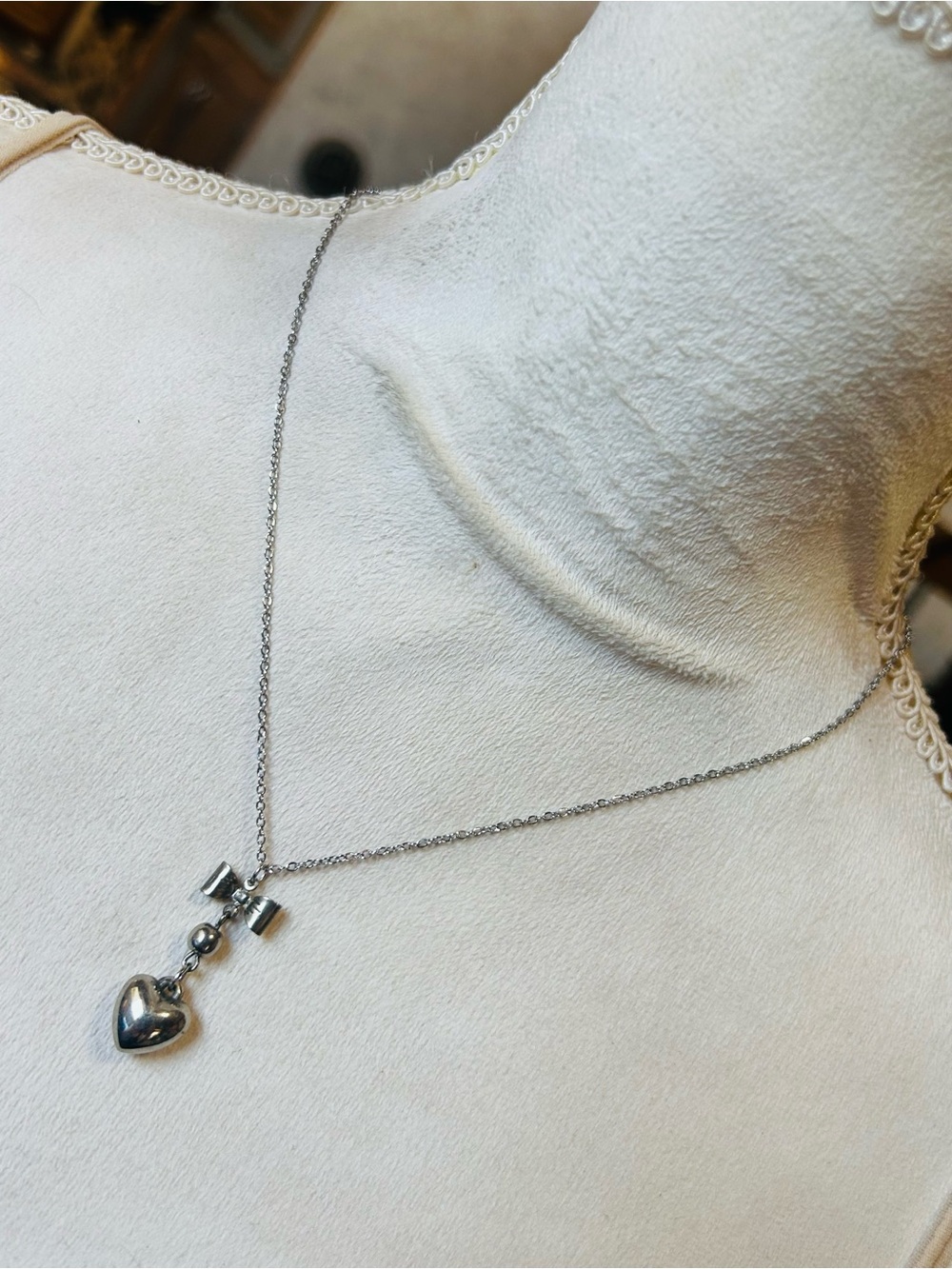 Handcrafted vintage bow with heart pendant on chain necklace